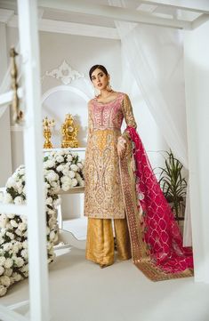 Buy Traditional Pakistani Women's Dress in Pink Color a Royal Pakistani Party Dress. This Traditional Pakistani Women's Dress Can be Customized on Demand. Gold Gown With Dabka For Eid, Traditional Gold Gown With Dabka Details, Gold Anarkali Dress With Dupatta, Gold Anarkali Dress With Resham Embroidery, Elegant Yellow Chinon Dress, Anarkali Gold Dress With Dabka Work, Gold Gown With Dabka In Traditional Drape Style, Gold Anarkali Dress With Dabka Work, Traditional Gold Gown With Dabka