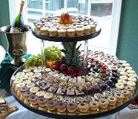 two tiered trays filled with assorted pastries