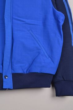 "Vintage Adidas windbreaker in a blue color way. This Adidas track jacket is in great condition only a button(see image) is missing. Size: 52 Material: 70% Polyamide 30% Cotton Made in Finland Measurement: - Chest(armpit to armpit: 55cm(21.5\") - Length from the backside(Center bottom of the collar to center bottom of the garment): 62cm(24.5\") - Sleeve(Shoulder seam to end of arm cuff): 61cm(24\") NOTE: Because of the age, clothing can shrink or the sizing from that time wasn't the same as the Adidas Jacket Vintage, Vintage Adidas Jacket, Adidas Crewneck, Adidas Sweater, Adidas Vintage, Adidas Windbreaker, Adidas Track Jacket, Vintage Windbreaker, Adidas Track