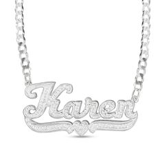 Create a unique fashion statement with the personalized design of this diamond hammered underlined name plate necklace in silver. Crafted in sterling silver This choice features your name - from three to 10 characters in length - sculpted in a bold artful font. Scrolling ribbons and a heart detail underline your name. Diamonds and the hammered texture add shimmer and shine. This 1/15 ct. t.w. diamond look suspends centered along a curb chain that secures with a lobster claw clasp. 18.0-inch tota Custom Silver Necklace With Diamond Accents For Anniversary, Silver Custom Necklace With Diamond Accents For Anniversary, Engraved White Gold Custom Nameplate Necklace, Personalized Silver Diamond Name Necklace, Silver Nameplate Necklace With Diamond Accents, Silver Engraved Diamond Custom Necklace, Custom Silver Diamond Necklace Engraved, Custom Silver Diamond Engraved Necklace, Personalized Silver Jewelry With Diamond Accents