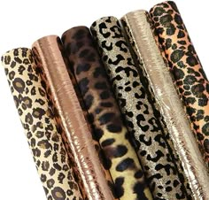 five different types of animal print fabrics lined up in a row on top of each other