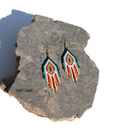 Native American Indian earrings Huichol earrings Black turquoise red Indian beaded Beaded earrings Indian jewelry Colorful earrings Short earrings American earrings Multicolored earring Fringe earrings Navajo earrings 3 inch colorful beaded earrings in American Indian style. These earrings are not authentic Native American earrings, but are made according to my author's design. I was inspired to create these earrings by the bright and colorful culture of the Indians of North and South America. C Southwestern Style Beaded Dangle Jewelry, Southwestern Style Colorful Beads Dangle Jewelry, Southwestern Style Dangle Jewelry With Colorful Beads, Southwestern Style Colorful Beaded Dangle Jewelry, Southwestern Turquoise Earrings With Colorful Beads, Southwestern Multicolor Round Bead Earrings, Southwestern Multicolor Earrings With Colorful Beads, Southwestern Red Earrings With Colorful Beads, Multicolor Southwestern Beaded Earrings