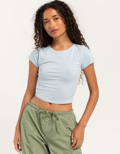 Tilly's Baby Tee. A Versatile And Stylish Staple. Solid Wash. Scoop Neckline. Short Sleeve. Fitted Silhouette. Cropped Fit. 95% Cotton, 5% Spandex. Machine Wash. Imported. Model Is Wearing A Size Small. Model Measurements:height: 5'6" Bust: 30"waist: 25.5"hips: 36.5" | Tillys Baby Tee Tillys Tops, Clothes For Back To School, Chino Pants Women, My Style Aesthetic, Outfit Inspo Cute, Wwe T Shirts, Flannel Sweatshirt, Back To School Clothes, Girls Graphic Tee