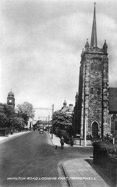 an old black and white photo of a church with a steeple on it's side