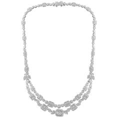 18.5 Carats VS, E Diamond Necklace made in 18 Karat white gold . One of our premium necklace from our Bridal collection. 18.5 carats of VS quality of Diamonds all mounted in 18 karat gold. Weight of the gold is 48 grams. Matching earrings are available . There are two layers in the necklace . Please take a look at my other pieces of jewelry and watches on 1st dibs FOLLOW MonalisaJewelry Inc. storefront to view the latest collection. Free Shipping with in United States We encourage you to take a Gold Necklace Bridal, Jewelry Vault, 1st Dibs, White Gold Necklace, Necklace Bridal, White Gold Necklaces, Drop Necklace, Quality Diamonds, Bridal Collection