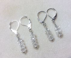 "Do you love faceted Herkimer diamonds?  Here are earrings in either 3 or 4 gem lengths.  The drop on the 3 gem pair is 3/4\", on the 4 gem pair is 1\".  These are New York Herkimers, mined in Herkimer, New York.  These Herkimers are faceted to catch the light and sparkle.  The findings are solid .925 silver." Nickel Free White Gold Drop Jewelry, Sterling Silver Jewelry With Diamond Cut In Clear Color, Clear Sterling Silver Diamond Cut Jewelry, Gift Diamond Cut Drop Earrings, Hypoallergenic White Gold Drop Jewelry, Diamond White Diamond Cut Long Drop Jewelry, Silver Faceted Jewelry As A Gift, Sterling Silver Drop Earrings In Diamond White, Nickel-free White Gold Drop Jewelry