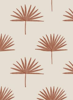 an image of a palm tree pattern on a white wallpaper with brown leaves in the background