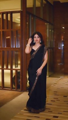 Party wear soft Georgette black saree for women, designer reception saree with fancy border, Indian saree for function, evening wear saree 1) Saree Details :  Saree Color: Black  Saree length: 5.5 meter. Saree Work : Thread with Sequence  Saree Fabric:  Soft Georgette  Saree type: Sequence embroidery saree 2) Blouse Details : (Semi Stitched) Blouse Color : Matching Blouse Length : 0.8 Meter Blouse Work : Plain  Blouse Fabric:  Mono Silk  Blouse wear by model is just for modeling purpose only actual blouse may vary. For more collection please visit : https://etsy.me/42iJXRw Washing Care : Dry Clean only Made for : Women Occasion : Farewell, Traditional, Wedding, Reception, Engagement, Festive, Casual, Party, Functions, Gift etc. WE ALSO TAKE BULK ORDERS FOR WEDDINGS AND OTHER OCCASIONS Note Saree For Function, Reception Saree, Sequence Saree, Saree Designer, Fancy Sarees Party Wear, Modern Saree, Saree For Women, Saree Designs Party Wear, Party Wear Saree