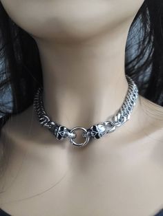 This is a Viking style chunky necklace, handcrafted with care using only the finest stainless steel materials. This piece features skull clasps that add a touch of gothic edge. The chunky style of this piece makes it a statement accessory, perfect for adding a bold touch to any outfit. Whether you're looking to treat yourself or surprise a loved one, this Norse goth necklace makes for an unforgettable gift. Its goth punk heavy metal hip hop jewelry style is sure to make a statement. Invest in a timeless piece of jewelry that seamlessly blends classic Viking style with contemporary gothic design.  25c43pr-20p200h Alternative Halloween Jewelry With Chain, Metal Emo Choker For Alternative Fashion, Alternative Halloween Chain Jewelry, Alternative Metal Choker For Halloween, Gothic Silver Jewelry With Chunky Chain, Silver Gothic Chunky Chain Jewelry, Silver Gothic Jewelry With Chunky Chain, Silver Emo Choker For Alternative Fashion, Gothic Metal Chain Necklace With Silver Chain