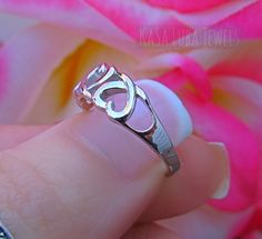 Hearts Love Sterling silver ring sizes 4-11 SOLID sterling stamped 925 silver Tarnish free 4 5 6 7 8 9 10 11 *IF YOUR SIZE ISNT SHOWING, MESSAGE ME. I might be sold out and will be able to replenish shortly* Top of ring height: 6.2mm Band width: 3mm Shank width: 2.4mm This is a High Polished solid sterling silver ring with Rhodium plating to prevent tarnishing. Nothing but the best from my custom jewelry store. --------------------------- Please follow care instructions. Any rings with stones, r Heart-shaped Sterling Silver Midi Rings For Anniversary, Sterling Silver Heart-shaped Open Ring For Valentine's Day, Silver Heart-shaped Stackable Rings For Valentine's Day, Adjustable Sterling Silver Heart Cut Rings, Heart-shaped Silver Stackable Rings For Valentine's Day, Adjustable Sterling Silver Open Heart Ring, Valentine's Day Silver Heart Ring In Sterling Silver, White Gold Sterling Silver Open Heart Ring, Valentine's Day Sterling Silver Heart Promise Ring