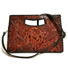 WOMEN'S  BAG  Featuring a gorgeous chiseled artisan design, this rustic  HAND TOOLED LEATHER Purse will help you bring a little VINTAGE flair to your everyday outfit. The perfect size for fitting all of your everyday essentials, this purse was actually handmade with love and care by talented artisans giving it a rustic touch that's hard to find in stores.  This purse comes CHISELED BOTH SIDES. The perfect choice as a GIFT FOR HER!! ( Birthday, Mothers day, etc.)  Measures: 🌹height: 20cm. 8  inc Vintage Embossed Satchel For Everyday Use, Vintage Embossed Tote Bag, Vintage Top Handle Shoulder Bag With Hand Tooled Detail, Vintage Hand Tooled Top Handle Shoulder Bag, Vintage Engraved Bags For Everyday Use, Vintage Top Handle Shoulder Bag With Hand Tooling, Traditional Engraved Rectangular Shoulder Bag, Traditional Engraved Rectangular Bag, Traditional Engraved Rectangular Bags