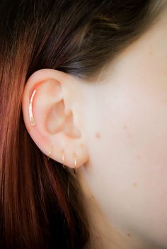 Handmade to order in Portland, Oregon.These earrings are simple, modern and beautiful.These little Ear Climbers in 14k Gold-Fill are incredibly sleek and stylish, with a fit so comfortable you’ll forget you’re even wearing them!You can now choose from either SMOOTH for a slightly faceted, reflective finish or HAMMERED for a sparkling, textured finish.Each earring will come with a classic ear nut backing. Choose ONE SINGLE CLIMBER (specify which ear) or a PAIR. Each Climber measures approximately Everyday Rose Gold Ear Cuff, Rose Gold 14k Gold Ear Cuff, Minimalist Rose Gold Ear Climbers For Everyday, Everyday Minimalist Rose Gold Ear Cuff, Everyday Minimalist Rose Gold Ear Climbers, Everyday Rose Gold Cartilage Earrings With Ear Wire, Single Rose Gold Ear Climber In 14k Gold, Rose Gold Single Ear Climber In 14k Gold, Minimalist Hypoallergenic Rose Gold Ear Climbers