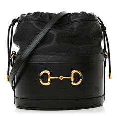 This is an authentic GUCCI Azalea Sakai Calfskin Horsebit 1955 Drawstring Bucket Bag in Black. This stylish shoulder bag is crafted of luxuriously textured calfskin leather in black. The bag has a sturdy base with a cinch-cord top. The bag also features an adjustable leather shoulder strap. The bag opens to a beige microfiber interior with a patch pocket. Gucci Formal Shoulder Bag With Dust Bag, Gucci Bucket Shoulder Bag For Evening, Designer Gucci Bucket Bag For Evening, Chic Gucci Bucket Bag For Evening, Elegant Gucci Bucket Bag For Evening, Gucci Bucket Shoulder Bag For Travel, Chic Gucci Bucket Bag With Removable Pouch, Chic Gucci Evening Bucket Bag, Gucci Formal Bucket Shoulder Bag