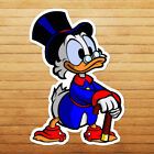 an image of donald duck sticker on a wooden surface