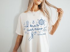 Take any special event to the next level with this exclusive and carefully crafted Disco-themed Comfort Colors tee. Made from premium cotton, this t-shirt offers a perfect blend of comfort and outstanding style. Whether it's a bachelorette bash, birthday party, or any other occasion, this shirt makes the perfect gift for everyone involved. Let's celebrate in style! 🥂 Note 👉🏼 You can expect a draft of your custom print within 24 hours for your review and approval. Please keep an eye out for a Bachelorette Tshirt, Disco Bride, Last Disco Bachelorette, Bachelorette Merch, Disco Bachelorette Party, Cowgirl Bride, Austin Bachelorette, Last Disco, Disco Bachelorette