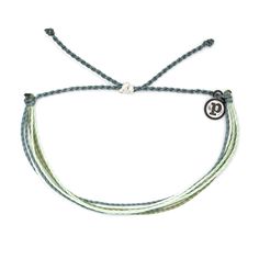 Be a green queen in this Earth Day mixed Original bracelet. This super-stackable style features strings in soft blue, green and white shades and packs an eco-chic punch. For each bracelet sold, Pura Vida will donate 5% of the purchase price to the National Parks Conservation Association, helping to fund its mission to protect and preserve Americas national parks for present and future generations. | Pura Vida Original string bracelet in Earth Day design. | Wax-coated polyester string cord with m Adjustable Green Bracelets For Everyday, Adjustable Multi-strand Bracelets For Summer, Everyday Adjustable Green Bracelets, Adjustable Green Bracelets, Green Friendship Bracelets With Sliding Knot, Adjustable Green Braided Bracelets For Everyday, Casual Turquoise Friendship Bracelets, Green Bohemian Braided Bracelets For Everyday, Everyday Green Bohemian Braided Bracelets