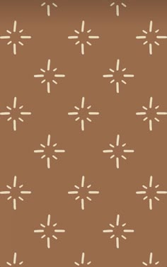 a brown background with white crosses on it