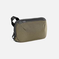 Slim Pouch - Olive — Aer | Modern gym bags, travel backpacks and laptop backpacks designed for city travel Functional Rectangular Pouch For On-the-go, Practical Travel Accessories With Removable Pouch, Functional Rectangular Travel Accessories With Removable Pouch, Practical Rectangular Travel Accessories With Zipper, Practical Rectangular Travel Accessories With Zipper Pocket, Multifunctional Everyday Zipper Pouch Case, Modern Travel Accessories With Zipper Pocket, Versatile Rectangular Cases With Zipper Pocket, Versatile Rectangular Case With Zipper Pocket