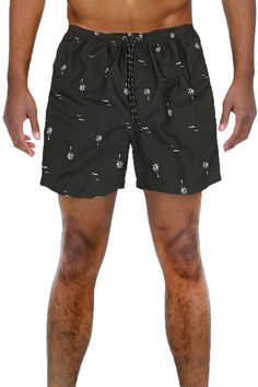 Fit & style*Model wears size L and is 6'2"*5.5" Inseam*Printed swim shorts*Soft fabric with an inner mesh liner*Full elastic waistband*Multiple pockets*Black / White Palm Tree print*polyesterMade In: ImportedFabric Contents: 100% Polyester Black Athletic Shorts With Built-in Shorts For Summer, Black Swim Trunks With Built-in Shorts For Beachwear, Black Sports Bottoms For Summer, Casual Black Shorts For Vacation, Casual Black Vacation Shorts, Black Beach Shorts With Elastic Waistband, Black Beach Shorts With Pockets, Black Pocketed Shorts For Beach Season, Black Swim Trunks With Pockets For Vacation