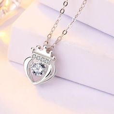 Main Stone: Cubic Zirconia Main Stone Quantity: 1 Pendant Size: 14.5mm * 10.5mm Metal Material: Solid 925 Sterling Silver Accent Stone: AAA Cubic Zirconia Metal Electroplating: Rhodium Pendant Only, Chain Not Included. Total Weight: 1.3g Women Dancing, Heart Shaped Frame, Heart Crown, Tarnished Jewelry, Moon Jewelry, Silver Accents, Metal Material, 925 Sterling Silver Jewelry, Sterling Silver Pendant