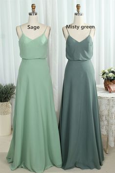 two bridesmaid dresses on mannequins in front of curtains