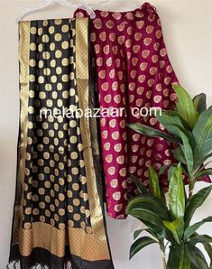 Soft and flowy Banarsi satin silk lehenga/skirt with a big flare and a coordinating Banarsi dupatta. Skirt length: 40 inches. Skirt waist: fits up to 38 inches. Dupatta: 96 by 34 inches. Color: Black and Wine Silk Long Skirt Sharara For Navratri, Festive Anarkali Set With Flared Skirt, Festive Floor-length Silk Skirt, Silk Anarkali Sharara With Long Skirt, Anarkali Style Silk Sharara, Festive Silk Lehenga With Dupatta, Sheer Dupatta Set With Long Skirt For Diwali, Diwali Long Skirt Set With Sheer Dupatta, Diwali Set With Sheer Dupatta And Long Skirt