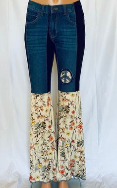 The most comfortable jeans you'll ever wear. One of a kind jeans with the Mama Mia ruffle will turn heads. Comfort and funky hippie style. Embellished with denim peace sign. These get noticed. SIZE XXS-L. You will need to size down. XXS - 0-4 XS-6-8 S- 8-12 M-12-14 L-16-18 Hippie Wide Leg Jeans For Fall, Bohemian Medium Wash Flare Jeans For Fall, Bohemian Flare Jeans In Medium Wash For Fall, Hippie Denim Bottoms For Fall, Wide Leg Hippie Jeans For Spring, Hippie Wide Leg Jeans For Spring, Bohemian Jeans With Relaxed Fit For Fall, Spring Hippie Wide Leg Jeans, Bohemian Denim Flare Jeans For Fall