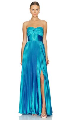 Find AMUR Stef Pleated Gown In Blue on Editorialist. AMUR Stef Pleated Gown in Blue. - size 00 (also in 0, 10, 12, 2, 4, 6) AMUR Stef Pleated Gown in Blue. - size 00 (also in 0, 10, 12, 2, 4, 6) Self: 97% recycled polyester 3% polyester Lining: 100% recycled polyester. Made in China. Dry clean. Partially lined. Hidden back zipper closure. Neckline to hem measures approx 53 in length. UAMR-WD212. 5819647. Between vivid prints and contemporary silhouettes, AMUR (also referred to as A Mindful Use o Senior Dresses, Nola Formal, Preppy Prom, Prom Inspo, Pleated Gown, Winter Formal Dresses, Mini Dress Formal, Prom Dress Inspiration, Cute Prom Dresses