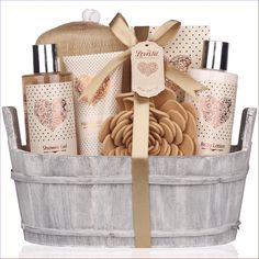 a basket filled with lots of different types of soaps and hand lotion bottles