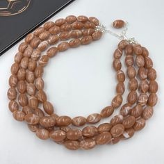 This beautiful Cacao Brown Statement Necklace is completely handmade with high quality. It can be worn with everything and everywhere, at a holiday party or after work with friends! This is a handcrafted necklace, uniquely designed with attention to every detail. Necklace length is 16.5" shortest strand plus additional 3 inch extender chain for length adjustment. Matching earrings are BONUS! Made of brown acrylic marble effect egg shape beads 18mm. - silver plated finding - clasp is platinum pla Short Layer, Long Layer, Brown Acrylic, Autumn Necklace, Thoughtful Gifts For Her, Chunky Statement Necklace, Bold Necklace, Brown Necklace, Necklace Chunky