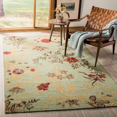 a living room area with a chair and rug