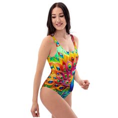 🦚This Women's One-Piece Swimsuit/Bathing Suit for all figures will bring out your best features. Enjoy the smooth fabric and the Unique Colorful Peacock Jeweled Design, and show it off by the beach or pool! * 82% Polyester, 18% Spandex * Fabric weight: 6.78 oz/yd² (230 g/m weight may vary by 5% * Chlorine-resistant fabric * Cheeky fit with a scoop neckline and a low scoop back * Zig-zag stitching * Double-layer front  * Four-way stretch material stretches and recovers on the cross and lengthwise grains Refer to Sizing Chart above in Photo Section Our Other One-Piece Swimsuits: https://www.etsy.com/shop/zazzfashion/?etsrc=sdt&section_id=45551037 Multicolor One-piece Swimwear For Pool, Tropical Multicolor Bodysuit For Pool, Multicolor Tropical Print Tankini For Swimming, One-piece Swimwear For Beach Festival, One-piece Printed Swimwear For Festivals, Printed One-piece Swimwear For Festival, Multicolor Beachwear Bodysuit For Beach, Tropical Multicolor Bodysuit For The Beach, Fitted Multicolor One-piece For Sunbathing