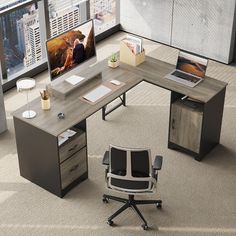 an office desk with a laptop computer on it and a chair in front of it