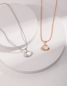 White Initial Pendant Necklace With Delicate Chain, Everyday Luxury Sterling Silver Tarnish-resistant Necklace, Gold Charm Necklaces In Elegant Style, Formal Initial Pendant Necklace With Clavicle Chain, Delicate White Initial Pendant Necklaces, Elegant Gold Sterling Silver Necklace, White Necklace With Pearl And Initial Pendant, White Pearl Pendant Necklace With Initial, Elegant Gold-colored Sterling Silver Necklace