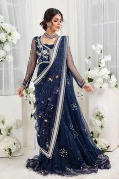 Glistening & Gleaming kamdani embellishments over midnight blue hue, a versatile floor-length gown with zardozi work on bodice finished with delicate ruffles & gota details. This look is completed with draped heavily embellished dupatta. Gown Fabric: Net & Silk Net Gown Length: 60” (customisable mention in order notes) Dupatta Fabric: Net (not stitched to outfit) Gown & Dupatta color: Midnight Blue This is a two-piece outfit including gown & Draped dupatta. All outfits are fully lined Lining in Dupatta Draping Style, Dupatta Draping, Net Gown, Blue Formal Dress, Dupatta Style, Net Gowns, Zardozi Work, Floral Lehenga, Designer Outfit