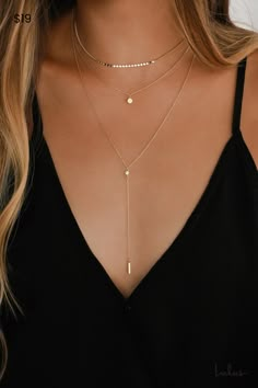 The Lulus Coretta Layered Gold Necklace is here to make your outfit perfect! Three layers of dainty gold chains, embellished with a row of round charms, a circle charm, and a drop chain embellished with a single rhinestone and bar charm, all come together to create a simple yet sweet look. Lobster clasp closure. Shortest chain measures 13. 5" long with a 3" extender chain. Longest chain measures 20" long. Drop measures 4". Man Made Materials. Imported. Lulus | Coretta Layered Gold Necklace. Gold Prom Jewelry Necklace, What Jewelry To Wear Neckline, Jewlerie Aesthetic Gold And Silver, Bridesmaid Jewelry Ideas, Prom Jewelry Necklace, Layered Necklaces Gold, Layered Gold Necklace, Gold Jewelry Prom, Gold Necklace Wedding