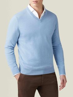 Our classic jumper is meticulously knitted in Bergamo, Northern Italy, using the finest two-ply pure cashmere. It features a slightly tailored silhouette that provides effortless comfort and allows for ease, while ensuring a neat and modern appeal. This luxurious V-neck weighs approximately 250 grams and has a refined 12-gauge knit, making it a perfectly insulated layer for autumn to spring.    We are proud to source only the finest A-grade fibres to produce superior cashmere yarn in the heart o Cashmere Suit, Cashmere Yarn, Cotton Chinos, Pleated Trousers, Wool Trousers, Northern Italy, Fine Yarn, Bergamo, Blue Sweater