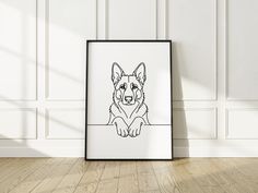 a black and white drawing of a german shepherd dog sitting in front of a wall