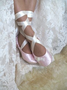 This lovely pale pink  bridal ballet style shoe  is an elegant and comfortable choice to  dance your way through your wedding day! Made of pale pink satin and embellished  with hand made tulle roses, pearls and lace,  they are a tasteful compliment to almost any gown from casual to elegant.  Satin ribbons tie ballerina style. Lined in satin and padded ,  their comfort will allow you to enjoy your day to the fullest. All of the shoes in my shop are individually custom made  by me, to each bride's specific measurements .  Please see the last photos for visual instructions on how to measure your feet while standing with your weight on them. 1. LENGTH 2. WIDTH 3. TOP WIDTH 4. HEEL WIDTH 5. ANKLE You MUST INCLUDE these measurements when ordering. Thanks for visiting my shop, be sure to look aro Ballet Shoes For Wedding, Luxury Pink Round Toe Wedding Shoes, Wedding Shoes Bride Light Pink, Pink Wedding Flats For Bride, Wedding Ballet Flats With Satin Bow, Wedding Closed Toe Ballet Flats With Satin Bow, Pink Closed Toe Wedding Shoes, Ballet Wedding Shoes, Bridal Ballet Flats