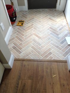 a wood floor that is being installed in a house