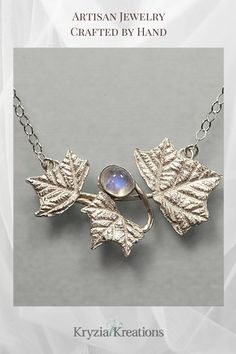 This fairytale-esque real leaf necklace looks like it was taken straight out of a mythical frozen forest with a glittering rainbow moonstone set among shimmering sterling silver leaves.  See more about this one-of-a-kind real leaf necklace at www.KryziaKreationsStudio.com Frozen Forest, Real Leaf, Rainbow Moonstone Necklace, Silver Leaves, Real Leaves, Holly Leaves, Holly Leaf, Moonstone Necklace, Leaf Necklace