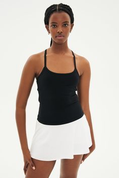 At long last our fabulous Airweight fabric in a full length support tank. Ultra luxe Airweight is feather light and buttery soft on your skin. BEST FOR: hot yoga, barre, Pilates. Model is 5’10” and wears a size small. Compressive Tank Top With Light Support For Yoga, Pilates Tank Top With Bra-friendly Wide Straps, Black High-stretch Yoga Tank Top, Yoga Tank Top With Built-in Padding And Medium Support, Black Compressive Tank Top For Yoga, Barre Pilates, Yoga Barre, Hot Yoga, Feather Light