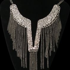 This Is A Gorgeous Silver Necklace With Multi Dangling Chains Hanging Off A V-Shape Nugget Texture Base. Measurements: 7" (Neck Opening) X 16" L X Approx. 4.5" W X 3 3/4 (Chain Ext.) (See Pics For Detail) N 18 Glamorous Silver Clavicle Chain Necklace, Gold Rhinestone Necklace For Parties, Rhinestone Necklace With Adjustable Chain For Party, Silver Jewelry With Chain For Party, Costume Jewelry Rhinestone Necklace With Clavicle Chain, Silver Metal Bib Necklace For Party, Silver Adjustable Chain Necklace For Fashion, Metal Dangle Chain Necklace Costume Jewelry, Party Metal Necklaces With Silver Chain