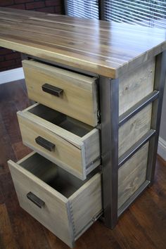 a wooden desk with drawers on top of it