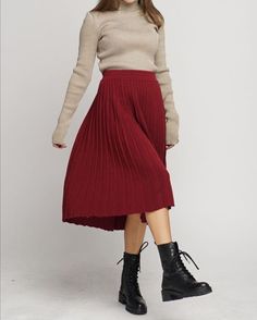 Woolen Midi Skirt is our shop's new items. Knitted from 100% Italian superfine merino wool. Classic and Warm Vinter Wool Pleated Skirt easily match any tops. The skirt is very soft, pleasant to the body. Ideal fit on any shape, and is suitable for sensitive skin. It will keep you warm in cold weather and comfortable for use the whole season.  Color Burgundy: Sizes L,XL available Measurements lying flat are: Lenght: 27,5" / 70cm Waist: 15-15,7" / 38-40 cm and more - skirt with slightly elastic wa Non-stretch Knee-length Winter Skirt, Winter Pleated Stretch Skirt, Winter Stretch Pleated Skirt, Chic Ribbed Fall Skirt, Chic Ribbed Skirt For Fall, Casual Winter Lined Skirt, Casual Knee-length Winter Skirt, Non-stretch Winter Midi Skirt, Non-stretch Pleated Winter Bottoms