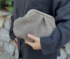 Discover timeless elegance with our Mink Clutch Bag. Handcrafted to perfection, this exquisite woven straw natural handbag is the epitome of artisan craftsmanship. Made from knitted raffia, it exudes an eco-friendly charm while providing a stylish solution for your essentials. The rich, mink hue of this clutch bag adds a touch of sophistication to any outfit, making it the perfect accessory for both casual outings and special occasions. Its versatile design allows it to complement a wide range of styles and ensembles. With a spacious interior, this clutch bag provides ample room for your essentials, whether you're heading out for a brunch date or an evening soirée. The natural raffia material not only offers durability but also a lightweight feel, ensuring comfort throughout your day or ni Elegant Beige Straw Bag For Everyday Use, Elegant Beige Straw Bag For Everyday, Elegant Beige Woven Bag, Elegant Woven Natural Straw Bag, Chic Everyday Straw Clutch Bag, Elegant Straw Pouch Bag For Everyday Use, Elegant Woven Natural Bags, Elegant Natural Woven Straw Bag, Elegant Brown Straw Bag For Everyday