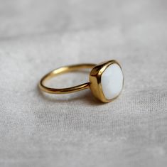 D E T A I L S - Material: 925 Sterling Silver Stone: White Agate The fit: True to US ring size Finish: Smooth and Gold Plated to a high shine S H I P P I N G & P R O D U C T I O N - My current production time is 2-6 business days, which means after those days are up, your order ships! I make everything custom to order, by hand, but I promise you it's worth the wait! R U S H - M Y - O R D E R - If you're in a rush to get your pretty new pieces, please send me a message and I'll let you know j Minimalist White Rings With Polished Finish, Adjustable White Rings With Polished Finish, White Adjustable Rings With Polished Finish, White Stackable Rings With Polished Finish As Gift, White Polished Stackable Rings For Gift, White Polished Finish Stackable Rings For Gift, Minimalist White Gemstone Birthstone Ring, Adjustable White Gemstone Stackable Rings, Minimalist Natural Stone Rings For Everyday