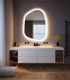 a bathroom with a large round mirror above the sink and lights on the wall behind it