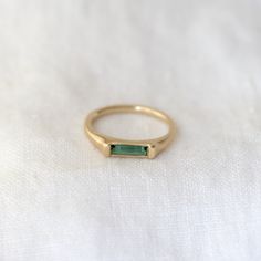 A slim rounded gold band with a signet like face made of a beautiful tourmaline bar - a sleek and modern way to add a pop of color to your stack! Details: Solid 14k Green Tourmaline baguette (8mm x 2mm) Slim Signet Ring, Modern 14k Gold Emerald Ring For Everyday, Minimalist Green Signet Ring, Grunge Jewelry, Baguette Ring, Bar Ring, Tourmaline Ring, Ring Ideas, Green Tourmaline