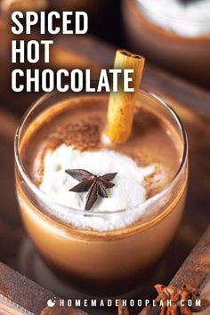 spiced hot chocolate in a glass with cinnamon on top